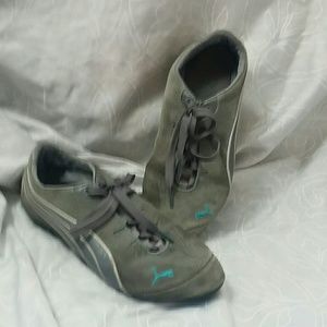 Grey on grey Puma tennis shoes